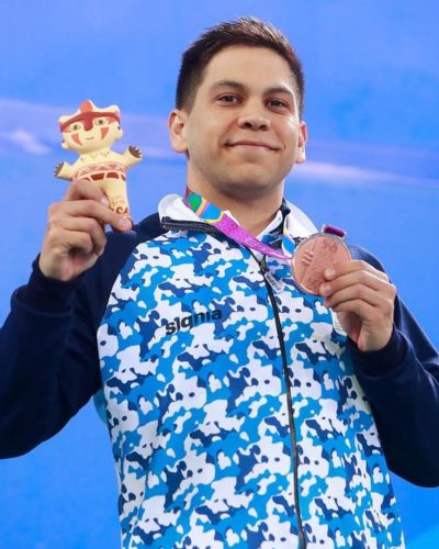 Amilcar Guerra con medalla de competencia